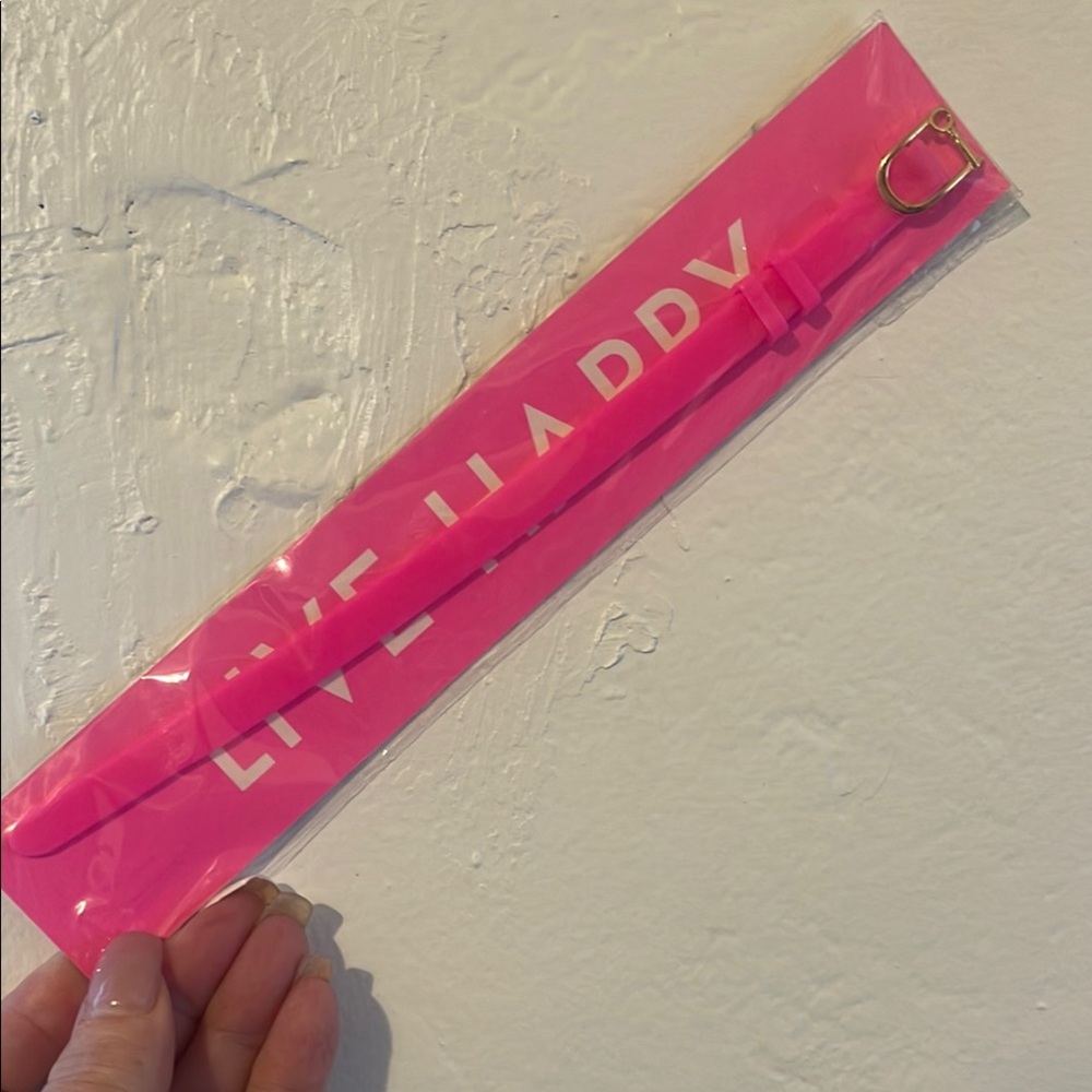 Pink Silicone Bracelet with gold hardware.